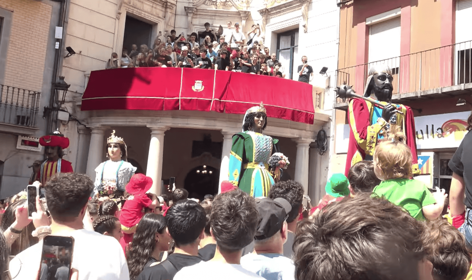 Traditional giants parading in Berga’s town square during La Patum