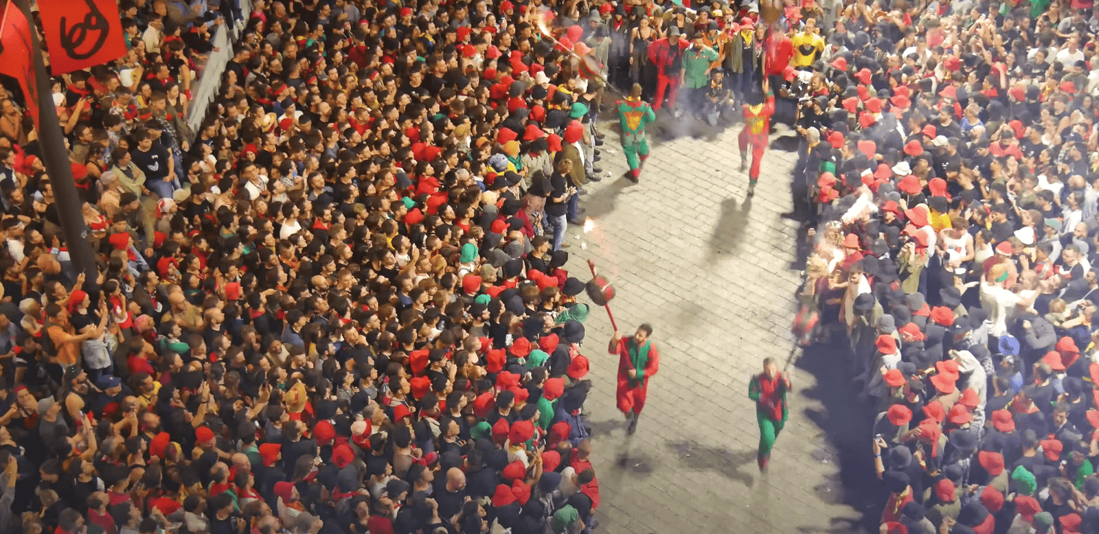 Overhead view of synchronized dancers in La Patum crowd