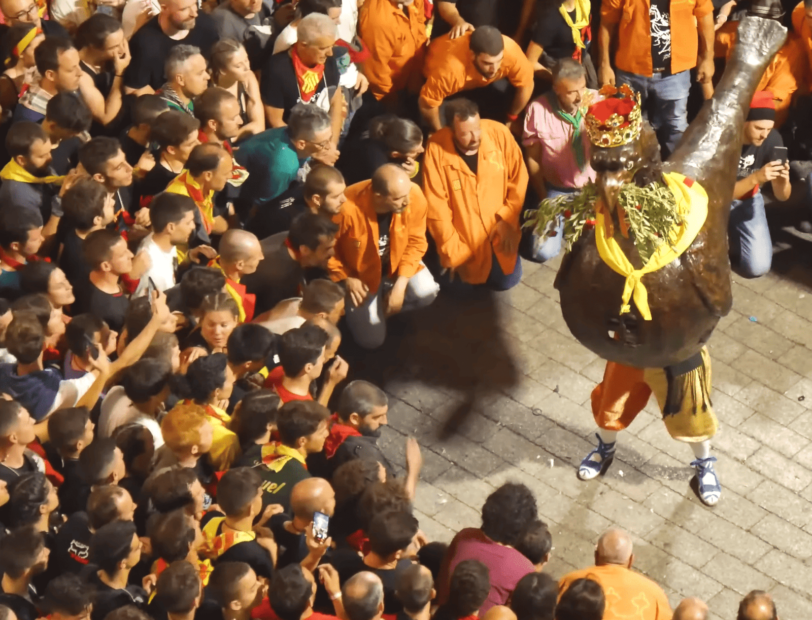 Giant eagle figure in the middle of the crowd during Patum