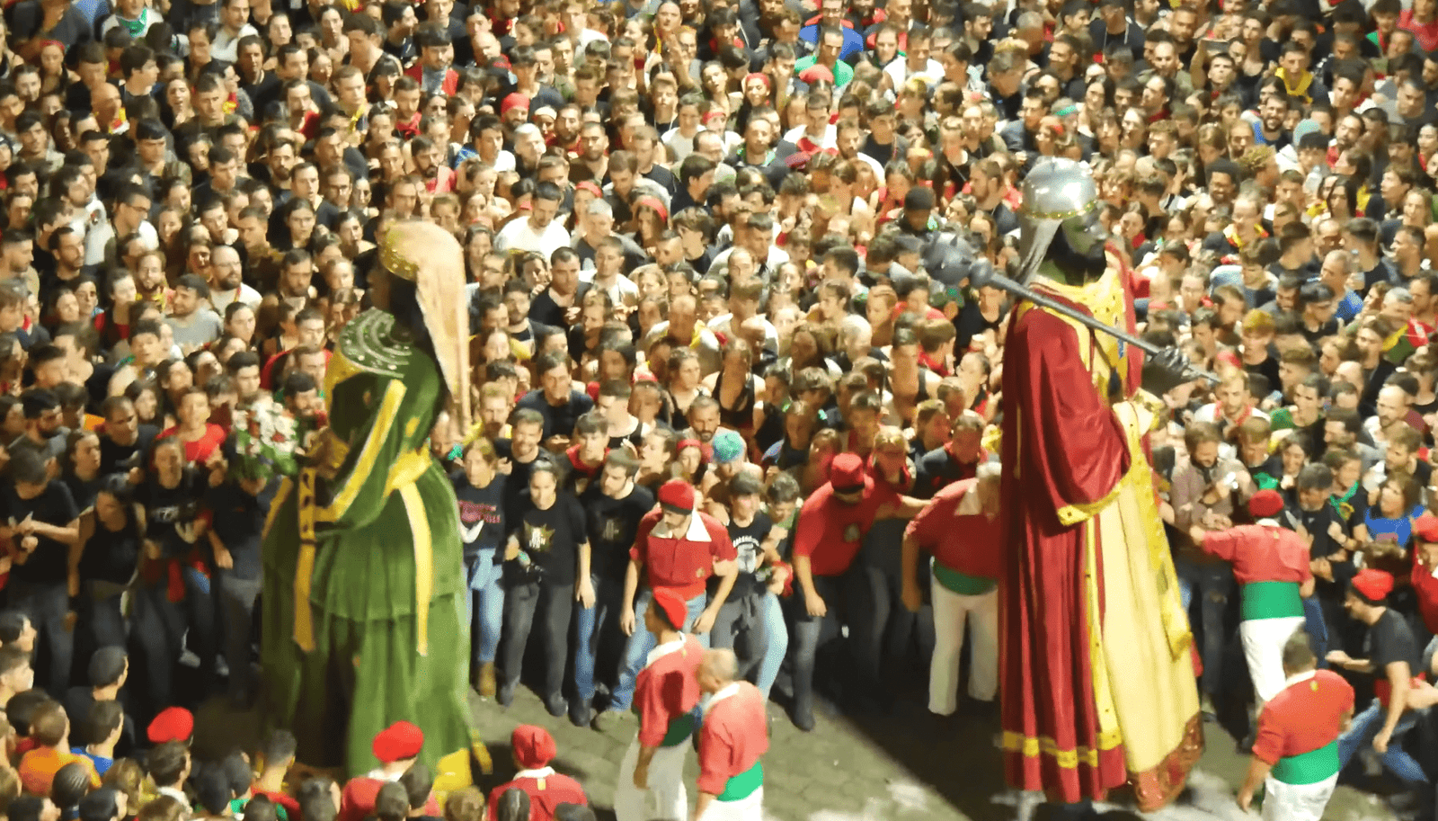 Close-up of the royal giants in a sea of people