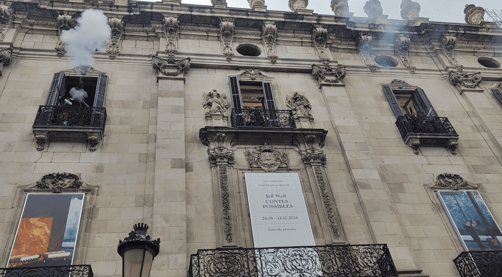 Smoke from the traditional opening shot of La Mercè, fired from the balcony of Palau de la Virreina in La Rambla.