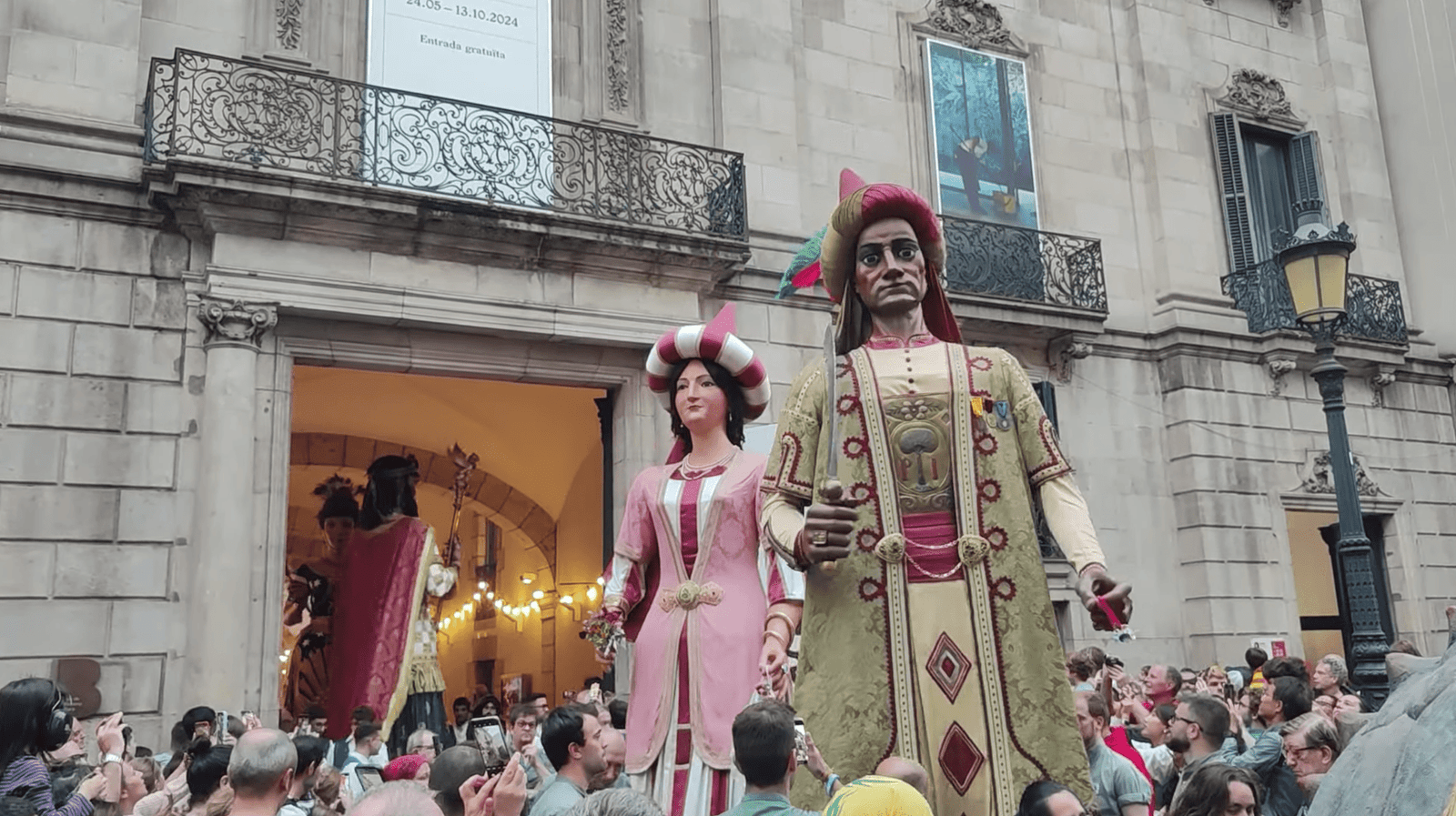 The Gegants del Pi, traditional giants of Barcelona, appear in front of Palau de la Virreina during La Mercè.