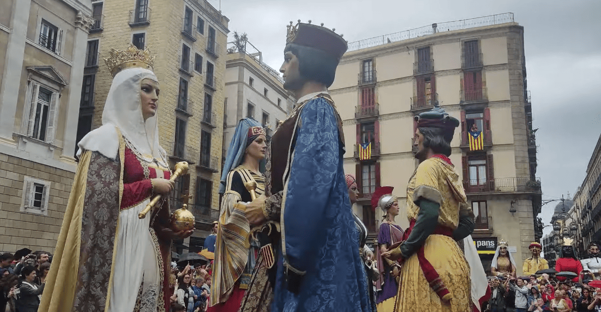 Royal Catalan giants parading through the Gothic Quarter during La Mercè festivities.