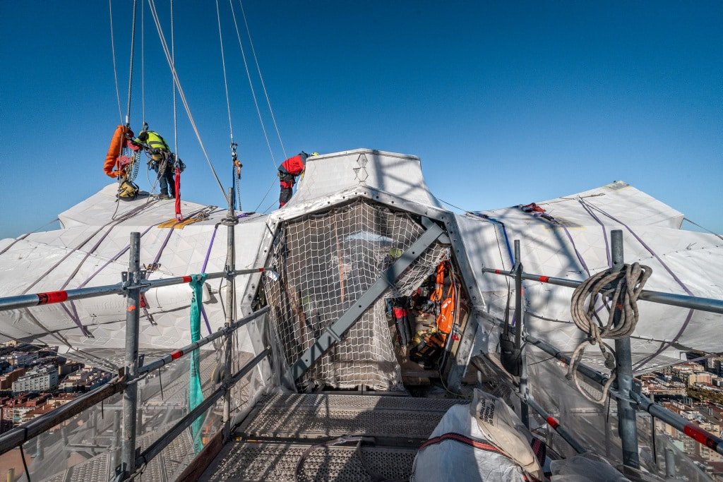 Second Horizontal arm installed on the cross of the Tower of Jesus Christ overlooking Barcelona
