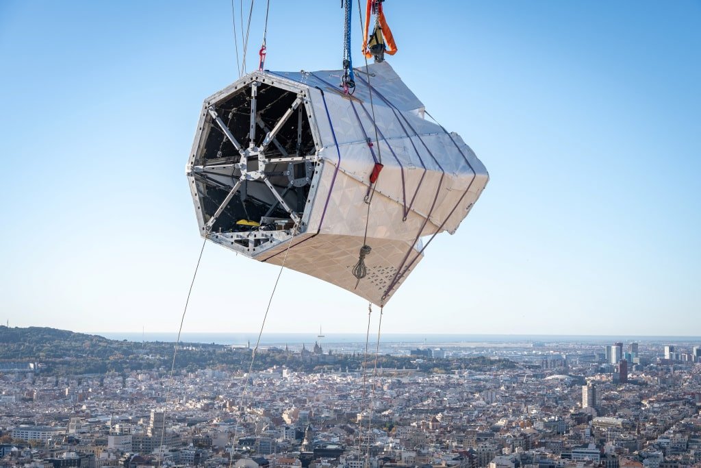 Second horizontal arm of the cross being lifted into place on the Tower of Jesus Christ at the Sagrada Familia