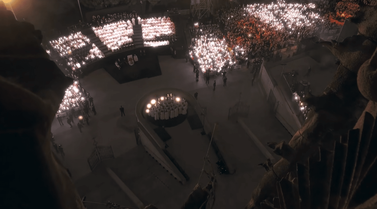 Aerial view of the audience gathered around the Sagrada Familia during the Antoni Gaudí centenary celebration.