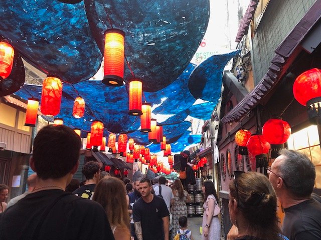 Festa Major de Gràcia 2025 red lantern decorations inspired by Spirited Away