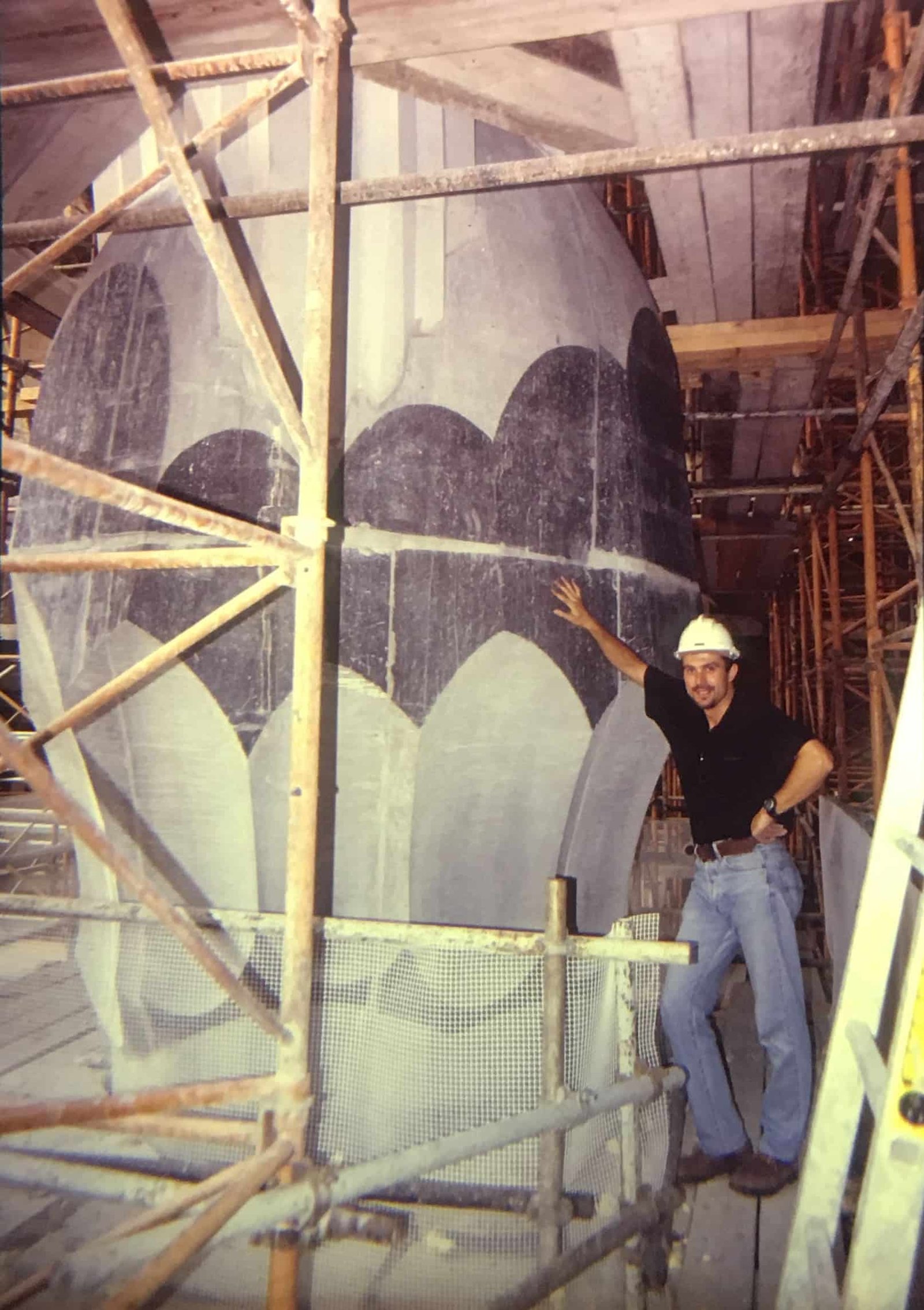 Javier and the Capital Column of Sagrada Familia, 1999 Javier touching the capital of a monumental column inside the Sagrada Familia in 1999