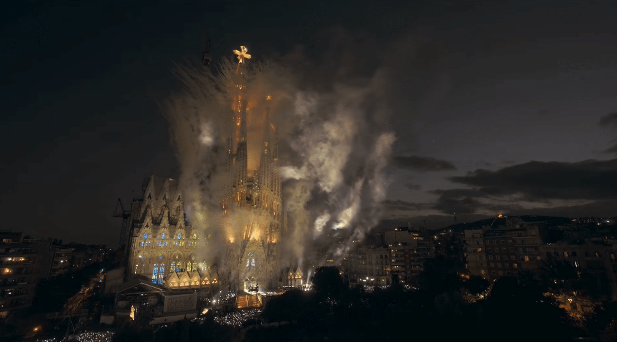 Smoke and fading fireworks surrounding the Sagrada Familia after the grand finale.