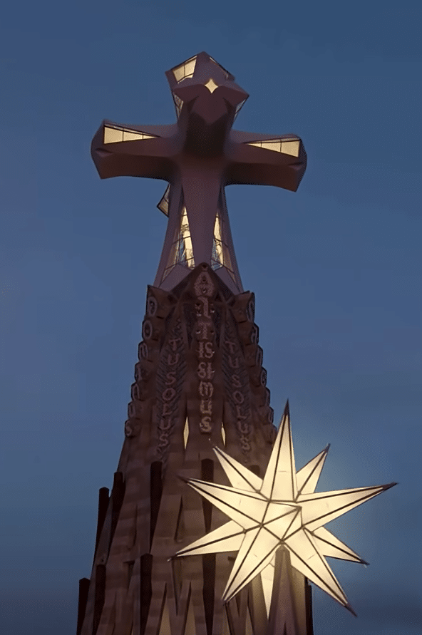 Image showing how the illuminated cross and golden star of the Jesus Tower will look when the Sagrada Família is completed.