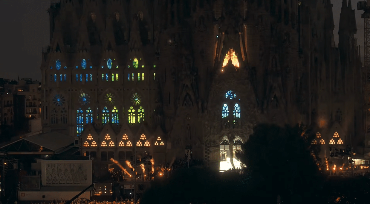 Illuminated stained-glass windows of the Sagrada Familia during the Gaudí centenary celebration.