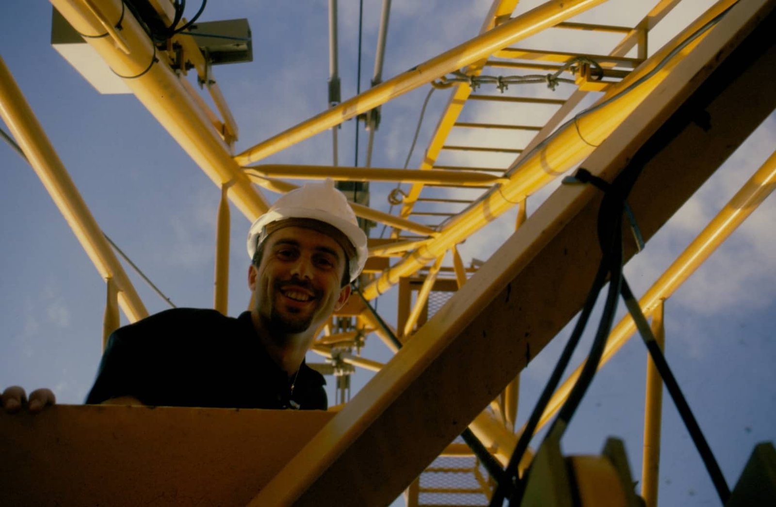 Next to the Sky: Javier by the Main Crane at the Sagrada Familia, 1999 Javier next to the main crane ladder at the Sagrada Familia construction site in 1999