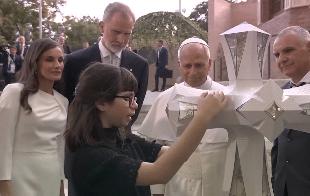 Blind girl Juliana presenting the symbolism of the Sagrada Familia to Pope and Spanish Royals during Gaudí centenary celebrations.