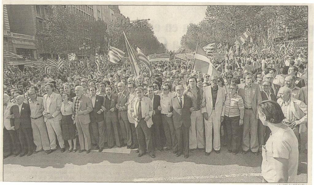 Front row of the 1977 La Diada march in Barcelona, with civic leaders leading demonstrators