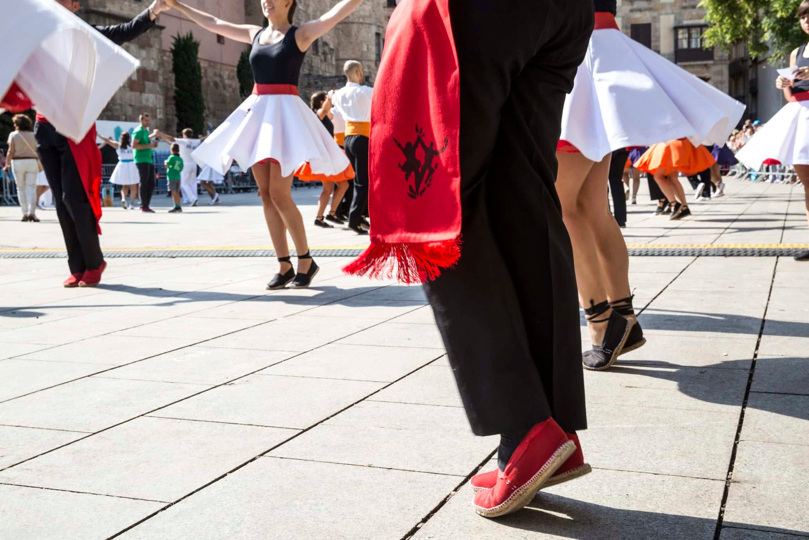 Close-up of dancers’ feet performing the Sardana during La Mercè in Plaça de la Catedral.