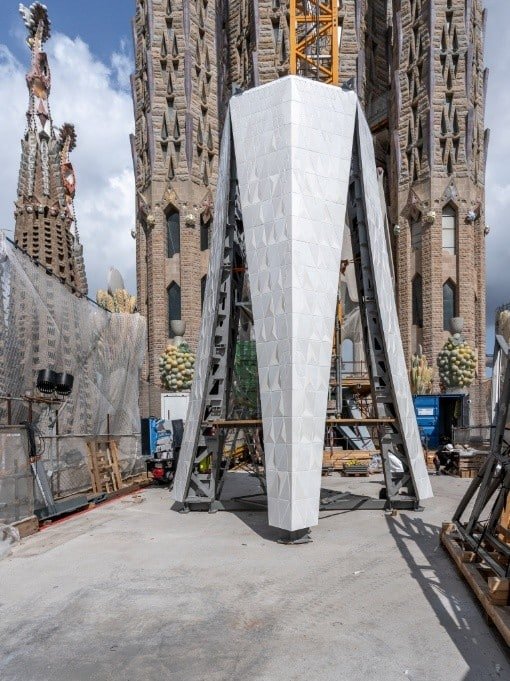Lower arm of the cross prepared on the ground before lifting to the Tower of Jesus Christ at the Sagrada Familia