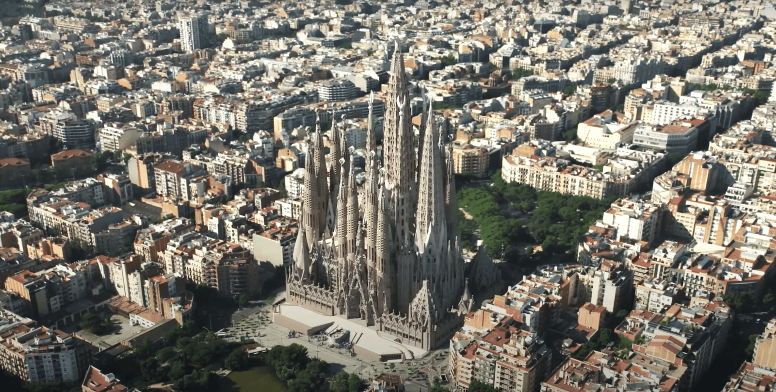Digital render showing how the Sagrada Família will look once completed, surrounded by Barcelona’s Eixample district.