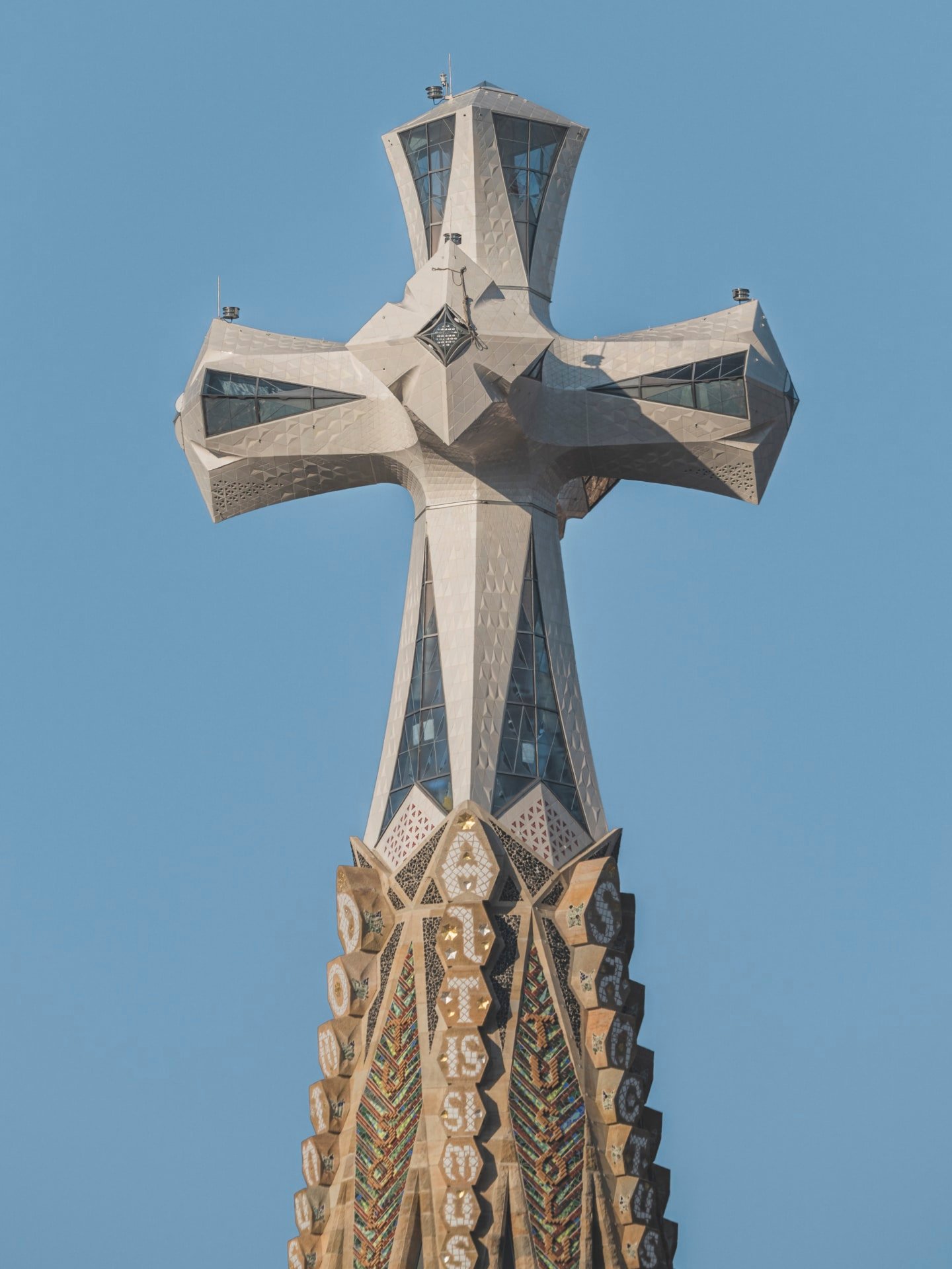 The completed cross atop the Tower of Jesus Christ at the Sagrada Família in Barcelona.
