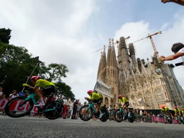 Cyclists racing past the Sagrada Familia during a previous Tour de France stage in Barcelona.