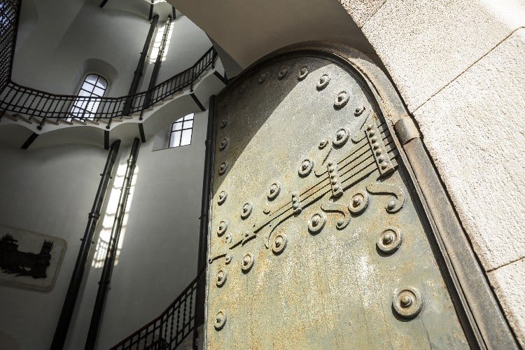 Open doorway revealing spiral staircase inside the Tibidabo Water Tower, Barcelona